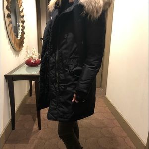 Sam. New York black fox hooded parka.